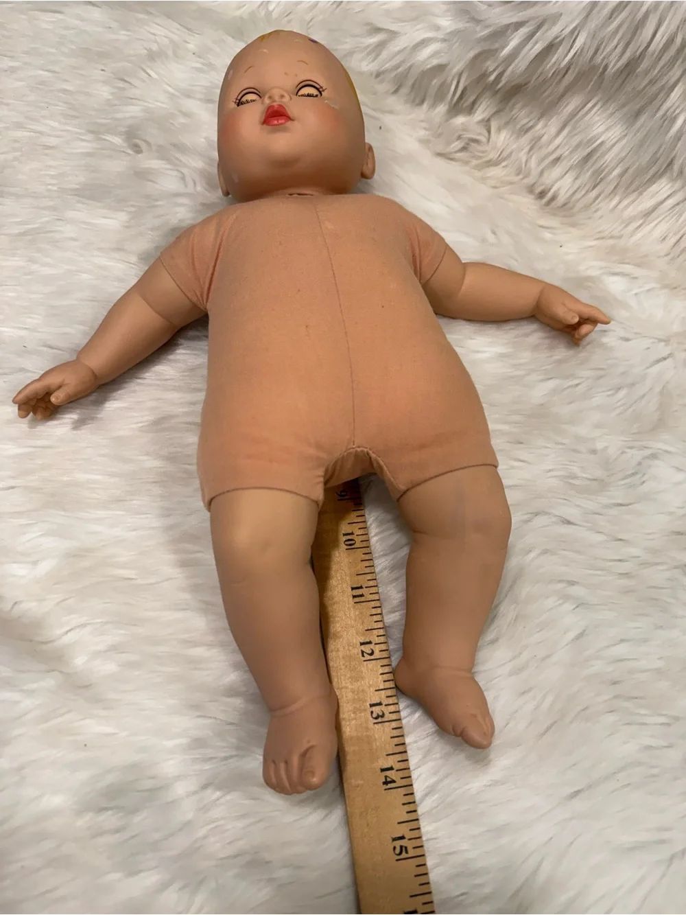 Madame Alexander 2010 Peach Vinyl Head Baby Doll with Blue Eyes